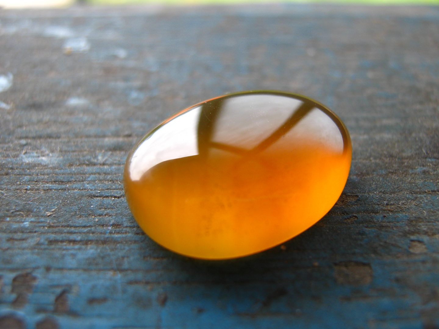 A picture of amber. In the form of a gemstone, not as a human.